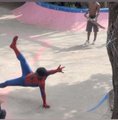 A person in a red shirt and blue jeans is shown doing a one-handed breakdancing move on a paved surface, appearing to fall or pose dramatically, while another person stands in the background near a pink and blue wall. The image humorously illustrates the frustration of the poster, who feels ignored after a week of engaging with another account that didn't reciprocate the follow.