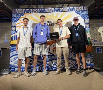 Four young men pose together for a photo at ETHGlobal Lisbon, holding a black plaque, with a decorative blue and white azulejo tile backdrop behind them.