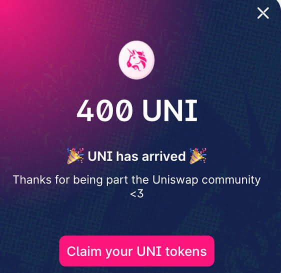 A pop-up notification announces '400 UNI has arrived' thanking the user for being part of the Uniswap community with a 'Claim your UNI tokens' button.