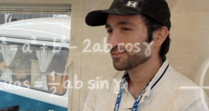 A young man wearing an Under Armour cap and white polo shirt, shown with mathematical formulas overlaid on the image including 'a²+b²-2ab cos γ' and '1/2 ab sin γ'.