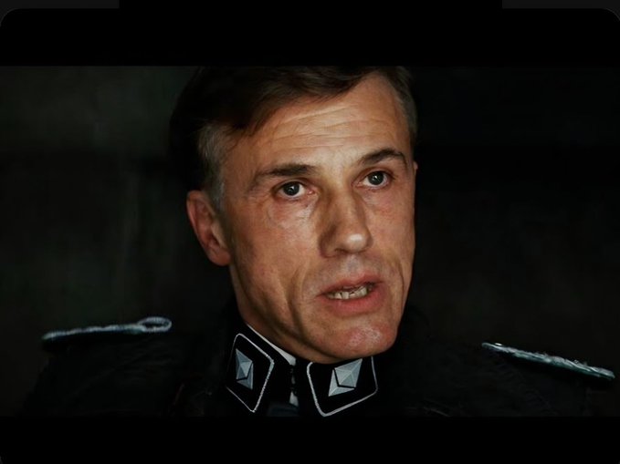 The image features a man wearing a military uniform, with his face turned towards the camera. He has a serious expression as he looks directly at the viewer. The caption below the image reads "When the ethereum dissident gives you that non-mandated stare". This suggests that the man in the picture might be discussing or reacting to something related to the Ethereum blockchain or cryptocurrency, given his military background and the fact that he is wearing a uniform.

The image also includes text elements such as "post" and "caption", which may provide additional context about the content of the image or its relationship with the caption.