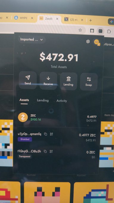 A computer screen showing a crypto wallet interface with total assets of $472.91, displaying 0.4977 ZEC ($472.91) with options for Send, Receive, Lending, and Swap.