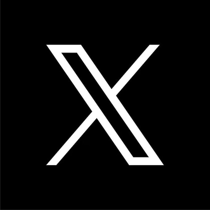 A bold white stylized "X" logo is displayed on a black background, serving as a visual anchor for a post celebrating the close-knit, worldwide community formed around the XRP cryptocurrency. The clean, minimalist branding emphasizes the global connection and relationships built within the XRP community beyond just financial gains.