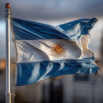 The flag of Argentina waves in the wind, featuring light blue and white horizontal stripes with the Sun of May in the center.