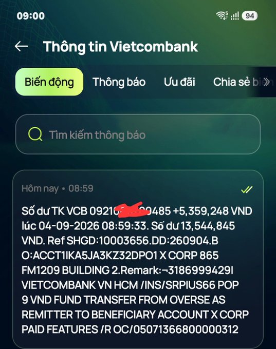 A screenshot of a Vietcombank transaction notification showing a balance increase of +5,359,248 VND from an overseas fund transfer.