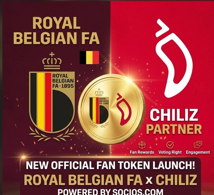 The image features a poster for the Belgian national soccer team, which includes a logo of the team's emblem and a coin. The text on the poster reads "New Official Fan Took Launch! Royal Belgian Fa x Chiliz". This suggests that the team is launching an official fan token in collaboration with Chilliz. The poster also mentions that this event is being powered by socios.com, which implies that it might be related to a social media campaign or partnership between the Belgian team and Chilliz.