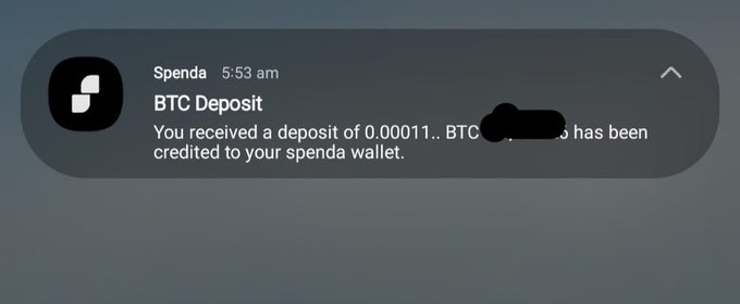 A mobile notification from Spenda at 5:53 am showing a BTC deposit of 0.00011 BTC credited to the user's Spenda wallet.