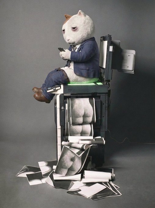 A surreal figurine of a cat wearing a navy suit sitting in a chair, looking at a phone, with a printer below producing photos that reveal the cat's rear end.