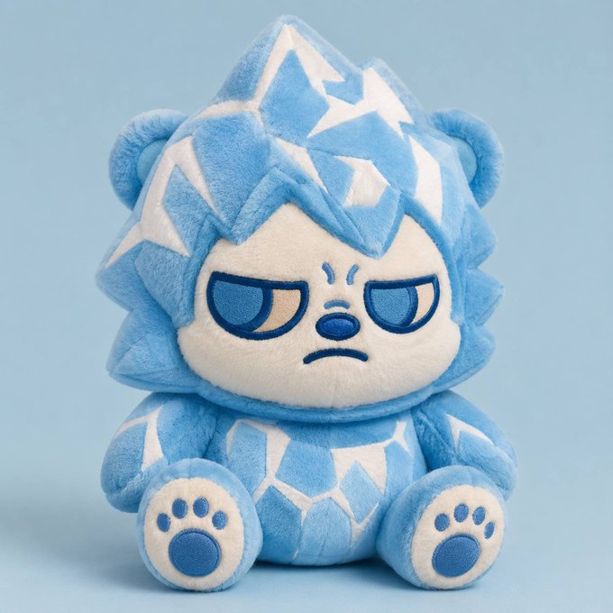 iced bear plush toy, blue and white fur, with a scowl expression, sits on a light blue background.