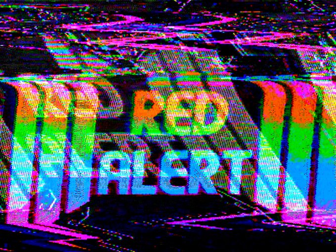 A glitch art-style image displaying the words 'RED ALERT' in large, distorted, multicolored block letters.