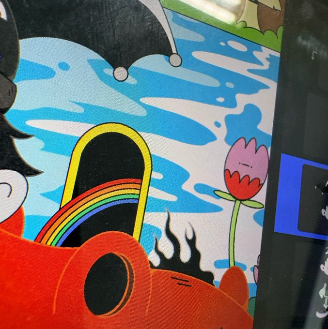 A close-up view of a colorful, cartoon-style illustration featuring a rainbow, flames, and a flower against a blue and white wavy background.