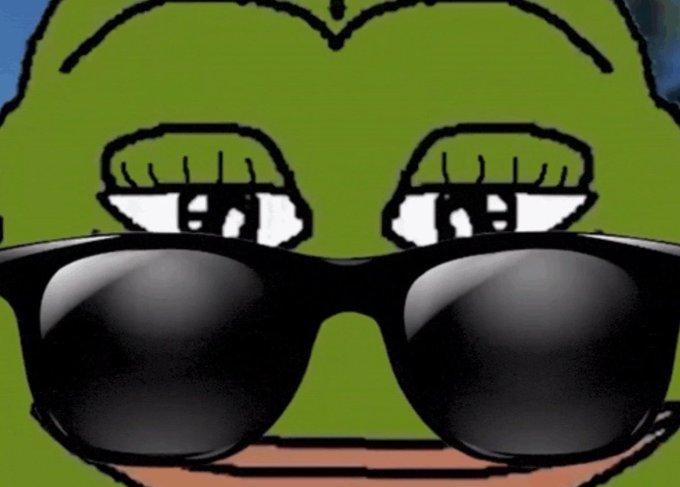 A cartoon Pepe the Frog wearing large black sunglasses with a smug, cool expression. The image plays into the post's nostalgic theme of returning to an "original" timeline, with the sunglasses-wearing Pepe evoking a retro, carefree vibe fitting the poster's throwback energy.