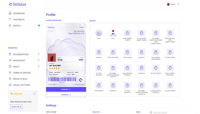 A screenshot of a BitRobot profile page showing a digital access credential card for 'Lab Specialist' Bunak ranked 1033, alongside various locked badge icons.