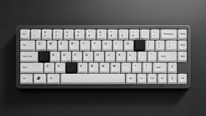 A minimalist white mechanical keyboard with dark gray accents on a black surface, featuring standard QWERTY layout keys.