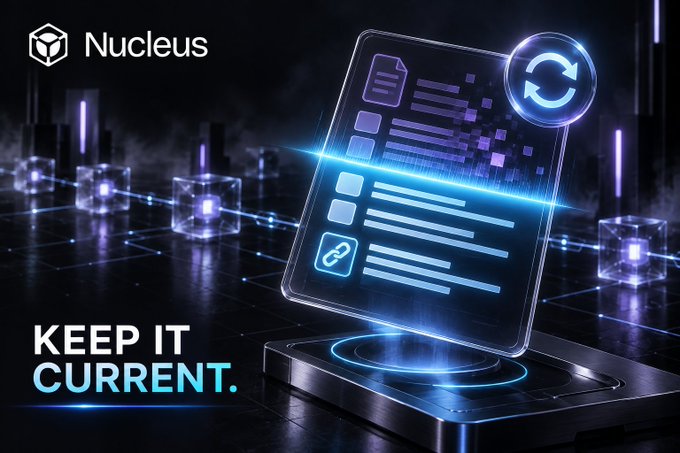 Promotional graphic for 'Nucleus' with the tagline 'KEEP IT CURRENT' featuring a holographic document/interface with a refresh icon and blockchain-style cubes in the background.
