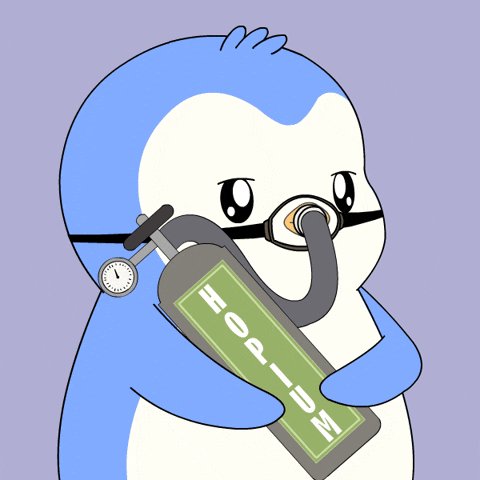 The image features a cartoon penguin holding a bottle of 60k Bitcoin, with the text "The best thing about 60k Bitcoin is knowing it's going to 600k" written below it. The penguin appears to be wearing glasses and has a gas mask on its face, giving it an unusual appearance that adds humor to the post.