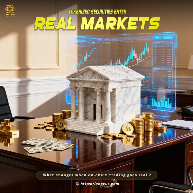 A marble bank model sits on a polished desk surrounded by gold Bitcoin coins, US dollar bills, and gold bars, with a glowing holographic stock chart displaying candlestick patterns behind it. The headline "TOKENIZED SECURITIES ENTER REAL MARKETS" appears in bold yellow text, with the tagline "What changes when on-chain trading goes real?" and qncxus.com displayed at the bottom, visually bridging traditional finance and digital assets.