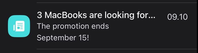 A dark notification banner from an app reading '3 MacBooks are looking for... 09.10 / The promotion ends September 15!'