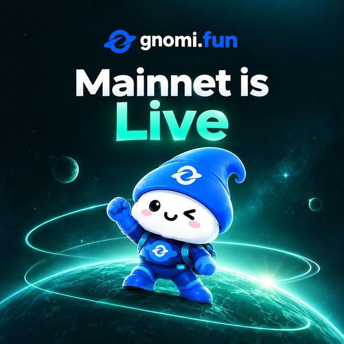 A promotional graphic for gnomi.fun announcing 'Mainnet is Live', featuring a blue gnome mascot in a spacesuit standing on a planet with glowing rings against a starry space background.