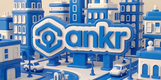 A 3D-rendered blue and white logo for 'ankr' cryptocurrency displayed in front of a stylized miniature cityscape.