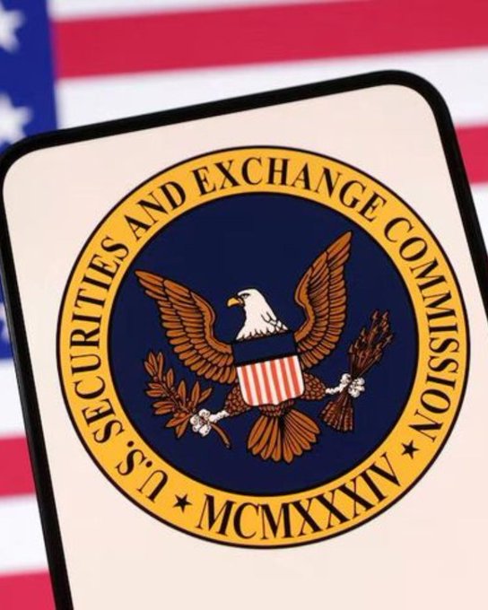 The image shows the official seal of the U.S. Securities and Exchange Commission (SEC), featuring an eagle with a shield, olive branch, and arrows, encircled by the text "U.S. SECURITIES AND EXCHANGE COMMISSION" and "MCMXXXIV" (1934), set against an American flag background. This visual directly supports the accompanying news about the SEC reshaping custody rules to allow investment firms to hold crypto for their clients—a regulatory shift that could open the door for Wall Street's deeper involvement in digital assets.