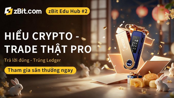 An advertisement for 'zBit.com' promotes 'zBit Edu Hub #2' with the text 'HIỂU CRYPTO - TRADE THẬT PRO' and features an image of a Ledger hardware wallet emerging from a gift box alongside mooncakes.