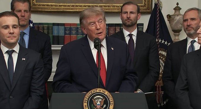 President Donald Trump stands at a podium at the White House with other men, including Brad Garlinghouse from Ripple, present, as indicated by the accompanying post. The image shows the presidential seal on the podium, confirming the location.