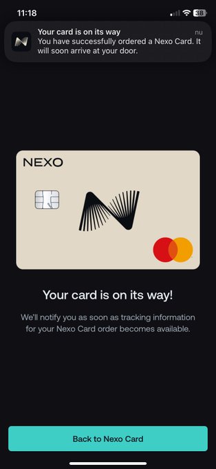 A mobile app screenshot from Nexo showing a confirmation message 'Your card is on its way!' for a newly ordered NEXO Mastercard credit card.