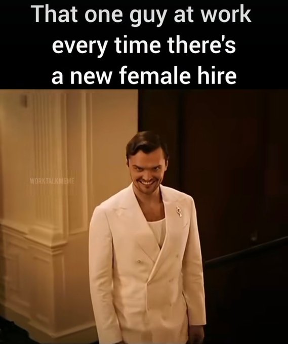 A meme featuring a man in a white suit smiling creepily, captioned at the top: 'That one guy at work every time there's a new female hire'.