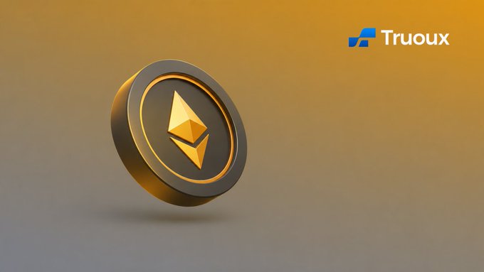 The image features a golden coin with an "Ethereum" symbol on top of it. The coin has been shaped like a triangle, giving it a unique appearance. The background of the image is a gradient color that transitions from yellow at the top to gray at the bottom. In the bottom right corner of the image, there's text that reads: "Focus on what is in the image and how it relates to the post".