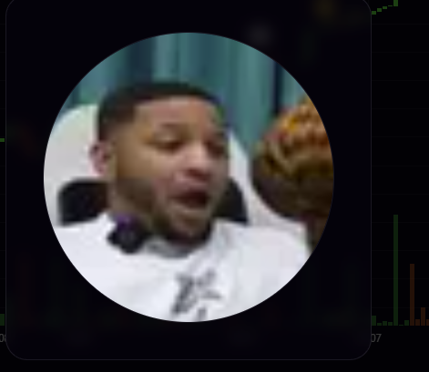 A circular cropped photo showing a man's face, appearing slightly blurry, set against a dark background with partial audio waveform graphics.