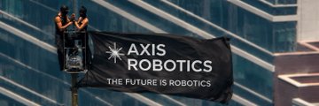 A black flag flies against a glass building, displaying the text 'AXIS ROBOTICS' along with the tagline 'THE FUTURE IS ROBOTICS' and a starburst logo.