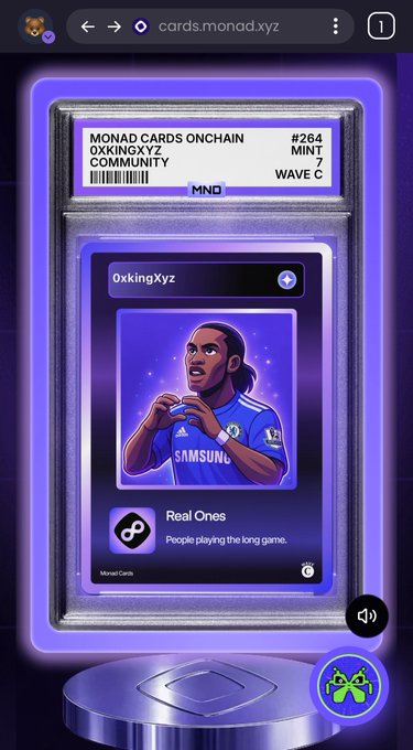 Another graded digital card from "MONAD CARDS ONCHAIN #264 OXXINOXYZ COMMUNITY WAVE C MINT 7," this one displaying an illustration of a soccer player in a blue Samsung jersey and the username "0xkingXyz."