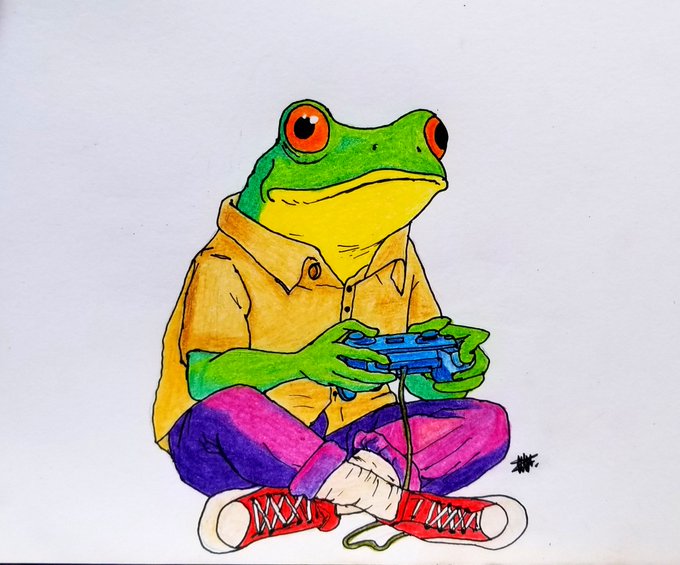 A colorful illustration of a green frog wearing a yellow shirt, purple pants, and red sneakers, sitting cross-legged while playing a video game with a blue controller.