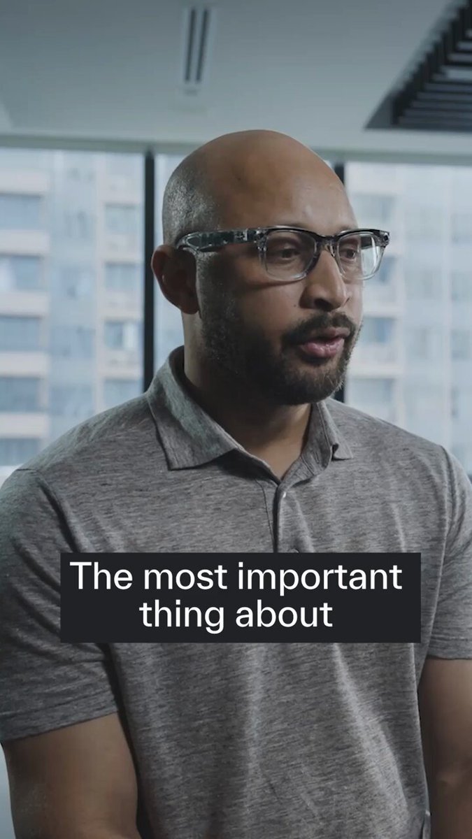The image features a man wearing glasses and a gray shirt with the text "THE MOST IMPORTANT THING ABOUT" written above his head. The man appears to be looking off into the distance, possibly contemplating something important or interesting that he has just read in the caption of the image.