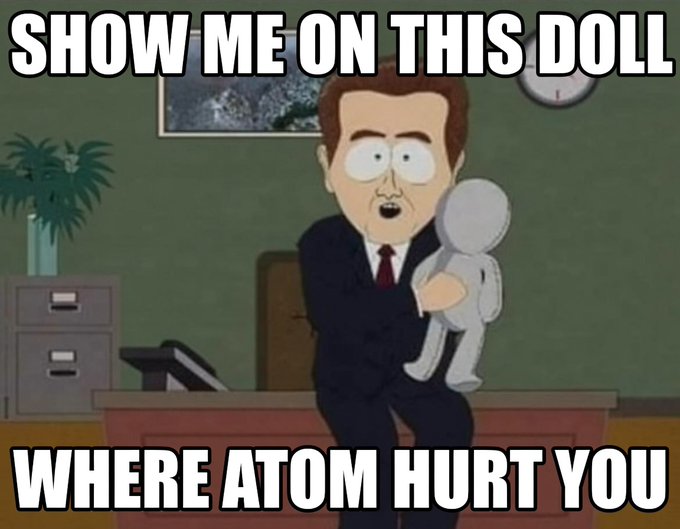 A South Park meme featuring a character in a suit holding a doll, with text reading 'SHOW ME ON THIS DOLL' at the top and 'WHERE ATOM HURT YOU' at the bottom.