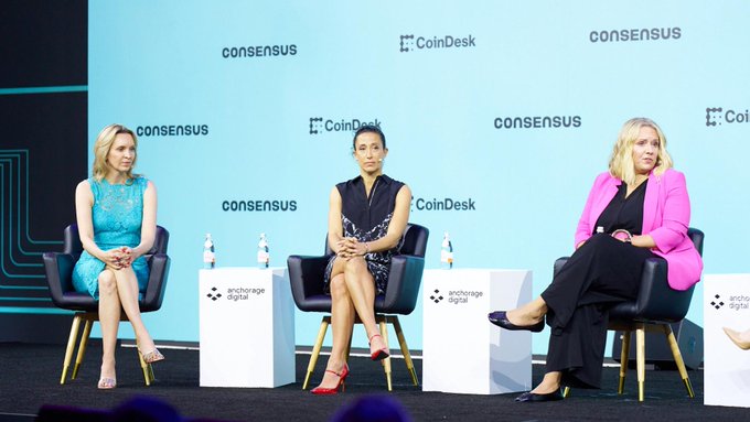 Panel discussion at the Consensus 2025 conference by CoinDesk, sponsored by Anchorage Digital, featuring three women seated on a stage with branded water bottles.