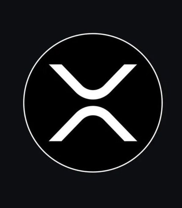 A black circular logo containing a stylized white 'X' shape, which is the symbol for the cryptocurrency XRP.