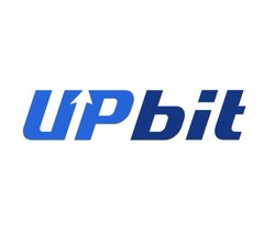 The image shows the Upbit logo, the logo of one of South Korea's largest cryptocurrency exchanges, in blue stylized lettering. It relates to the accompanying post by visually identifying Upbit as the exchange where XRP trading volume surged 273% to $1.84B, leading crypto activity in South Korea.