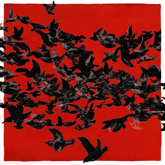 An artistic image features a dense flock of black bird silhouettes flying across a vivid red background, with a small white signature visible in the lower right.