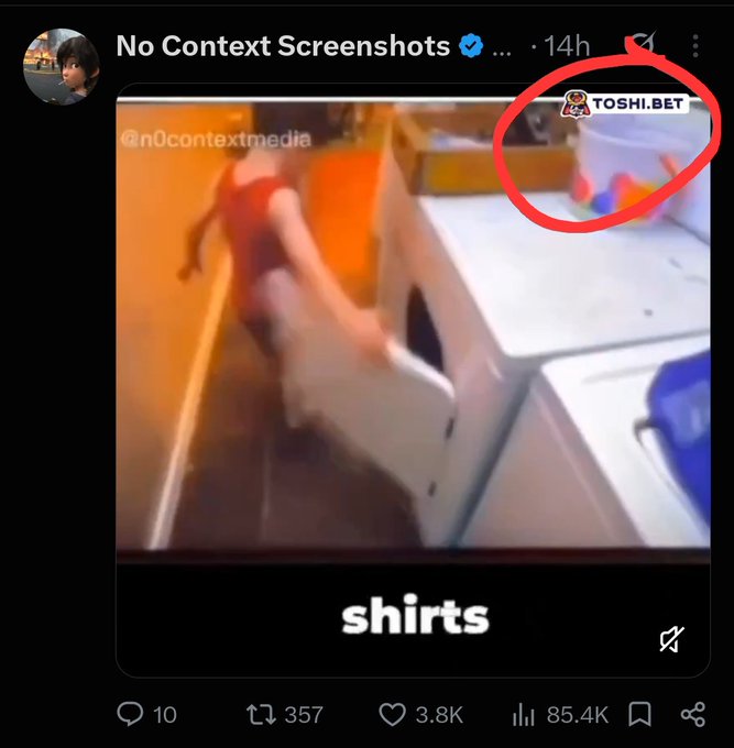 A screenshot of a "No Context Screenshots" post captioned "shirts" showing a person tumbling into a washing machine, with the @ToshiBet logo circled in red in the corner, seemingly an unauthorized ad placement that the user is questioning. The post has 3.8K likes, 357 reposts, and 85.4K views.