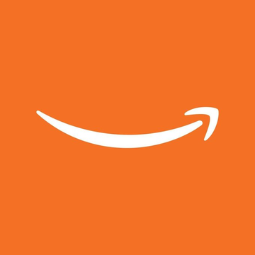 The Amazon logo is shown, a visual representation of the company behind Zoox's autonomous, steering wheel-free robotaxis cleared for US deployment. Tokenized $AMZN is also live on Solana.