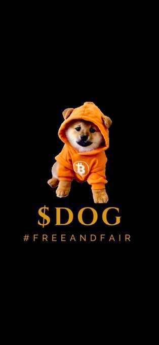 A graphic of a Shiba Inu dog wearing an orange hoodie with a Bitcoin 'B' logo, accompanied by the text '$DOG' and the hashtag '#FREEANDFAIR' on a black background.
