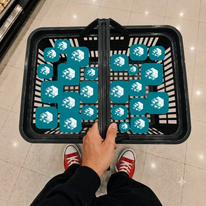 A first-person view looking down at red sneakers and a shopping basket containing numerous teal icons featuring a geometric logo design.