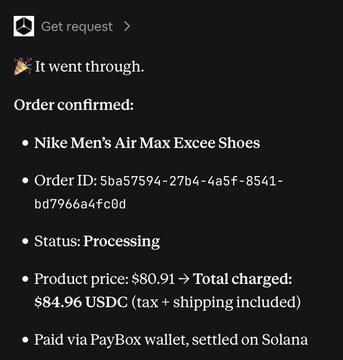 A confirmation message for a Nike Men's Air Max Excee Shoes purchase, Order ID 5ba57594-27b4-4a5f-8541-bd7966a4fc0d, showing the product price of $80.91, total charged $84.96 USDC, paid via PayBox wallet on Solana, with status Processing.