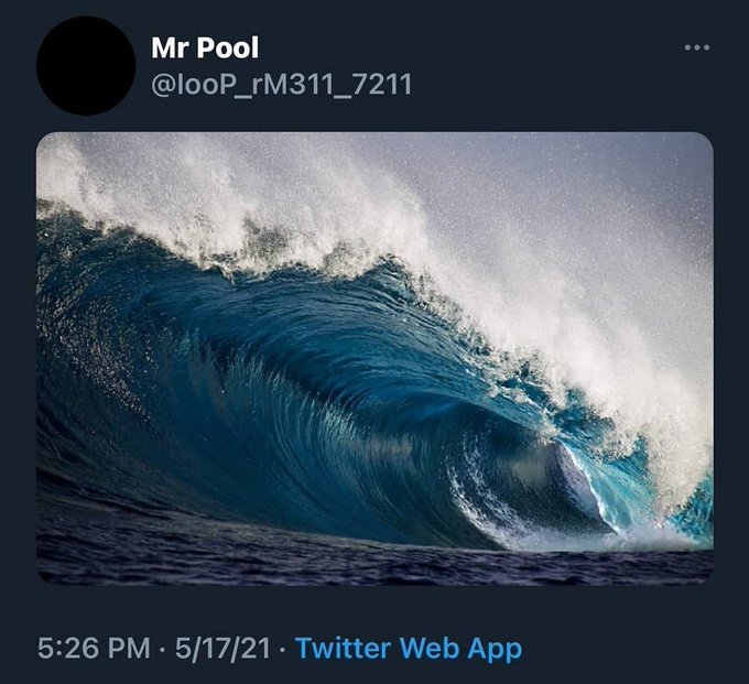 A dramatic ocean wave curls into a tube, resembling the crescent shape of a moon against the dark water. The tweet from "Mr Pool" (@looP_rM311_7211) posted at 5:26 PM on 5/17/21 jokes that the wave's shape is a "Moon date right there," playing on the visual similarity between the curling wave and a lunar crescent.
