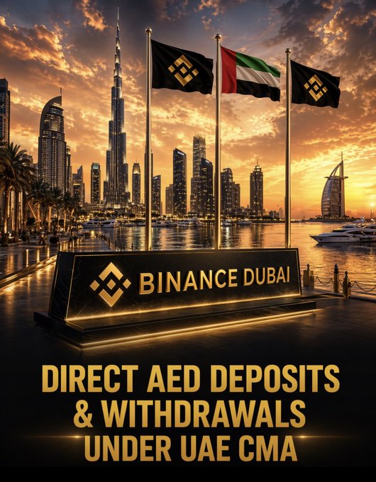 The image features a cityscape with three flags flying high above it - one representing the United Arab Emirates (UAE), another representing Bitcoin, and the third representing the Binance Dubai company. The text below the flags reads "Direct AED deposits & withdrawals under uae CMA", indicating that users in the UAE can now easily access their funds through direct deposits or withdrawals from their bank accounts using the Binance Dubai platform.