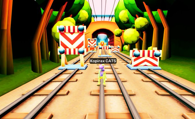 ikerax.cats is the name displayed on a sign, with a yellow and black cat statue in front of an orange tunnel entrance.