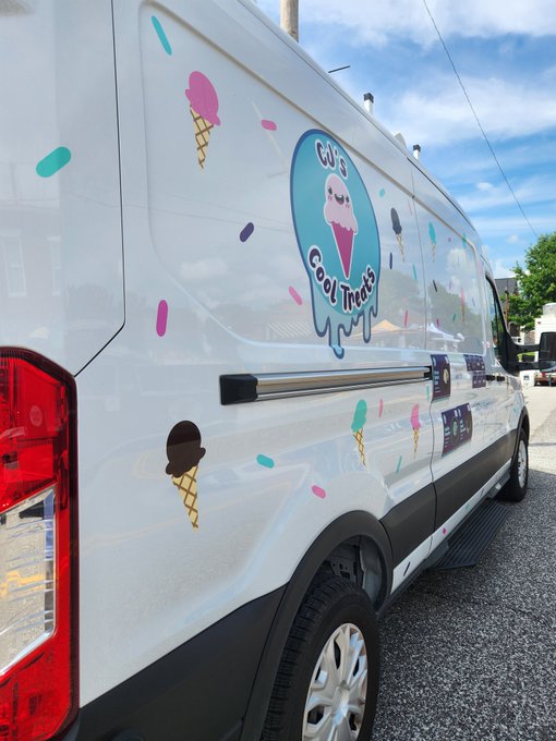 The side of a white van is decorated with colorful ice cream cone decals and a logo reading "Cal's Cool Treats" featuring a smiling ice cream cone character.