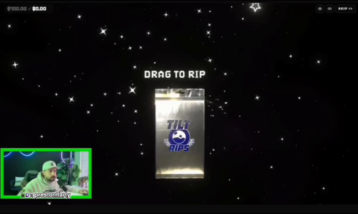 The image shows a man sitting at a desk with a computer screen displaying an advertisement for a product called "Drag to Rip". The background of the image features stars, giving it a space-themed appearance. The text in the image reads "Drag to Rip" and "@XOOBNetwork", which suggests that this is part of a marketing campaign or promotional material related to the product being advertised.